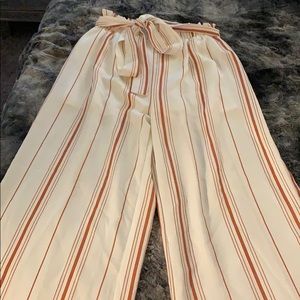 White and rust colored striped high waisted pants